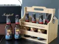 Cervezas personalizadas regalo: seis botellas de Estrella Galicia en un cesto de madera, con fotos y mensajes divertidos.