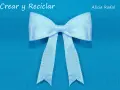 Un lazo blanco de satén, perfecto para decorar o hacer un regalo. Aprende a hacer lazo con cinta.