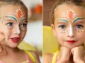 Niña con cara pintada de carnaval, lista para la fiesta.