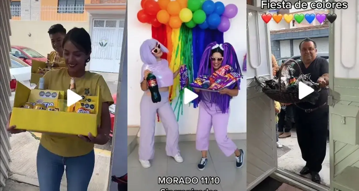 Una fiesta temática de colores vibrantes con globos arcoíris y atuendos morados. Un hombre entrega una canasta de regalos.