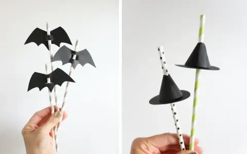 Decoración Halloween manualidades: pajitas con murciélagos de papel negro y sombreros de bruja.