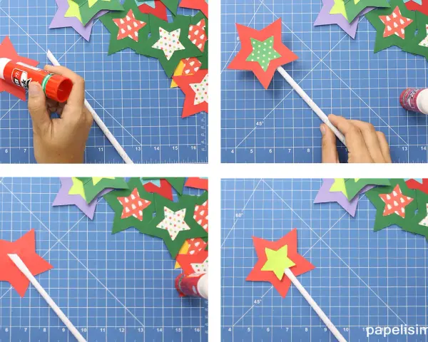 Creando varitas mágicas caseras. Pegando estrellas de papel para dar vida a la magia.