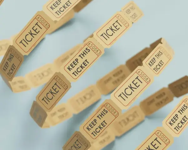 Boleto de rifa, ideal para saber como realizar un sorteo. Cada boleto tiene un número y la indicación "KEEP THIS TICKET".