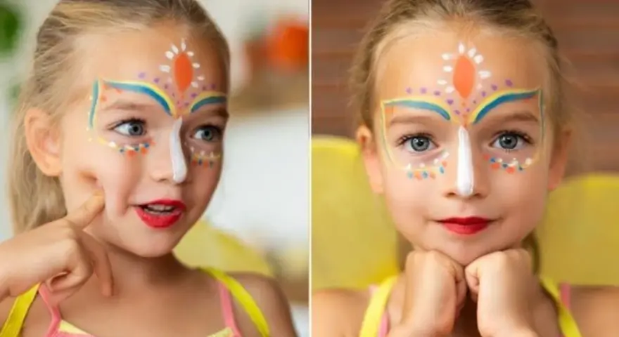 Niña con cara pintada de carnaval, lista para la fiesta.
