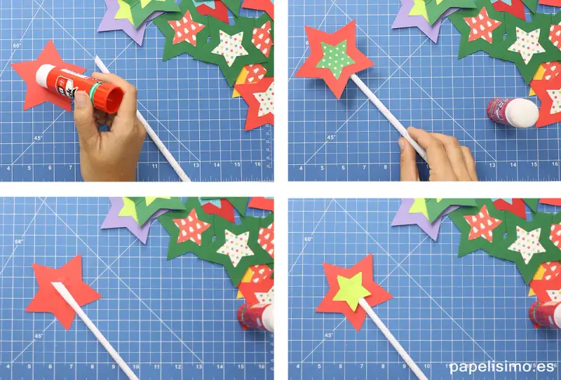 Creando varitas mágicas caseras. Pegando estrellas de papel para dar vida a la magia.